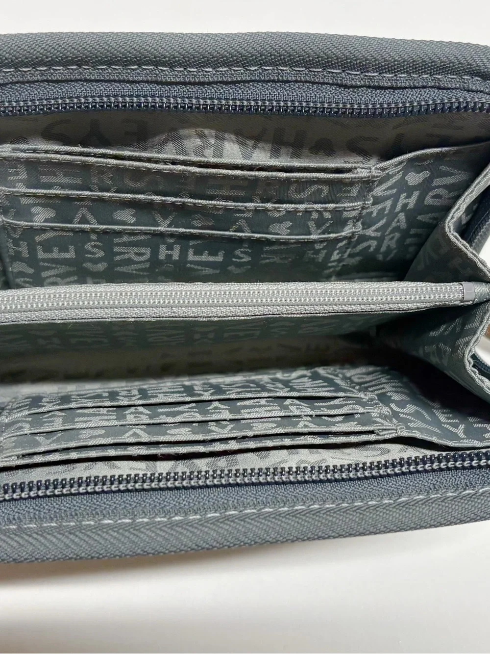 Harveys Black Multicolor Patchwork Disneyland Wristlet